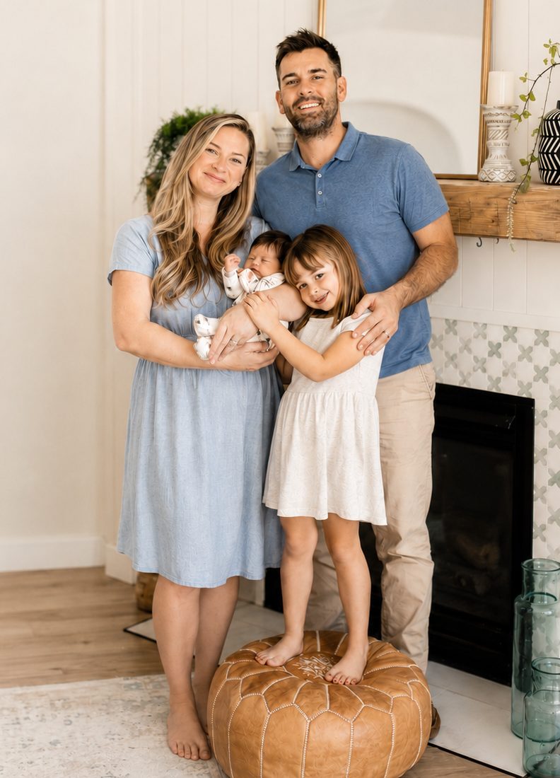 Catie Weide with her husband and two daughters at home in Jacksonville.